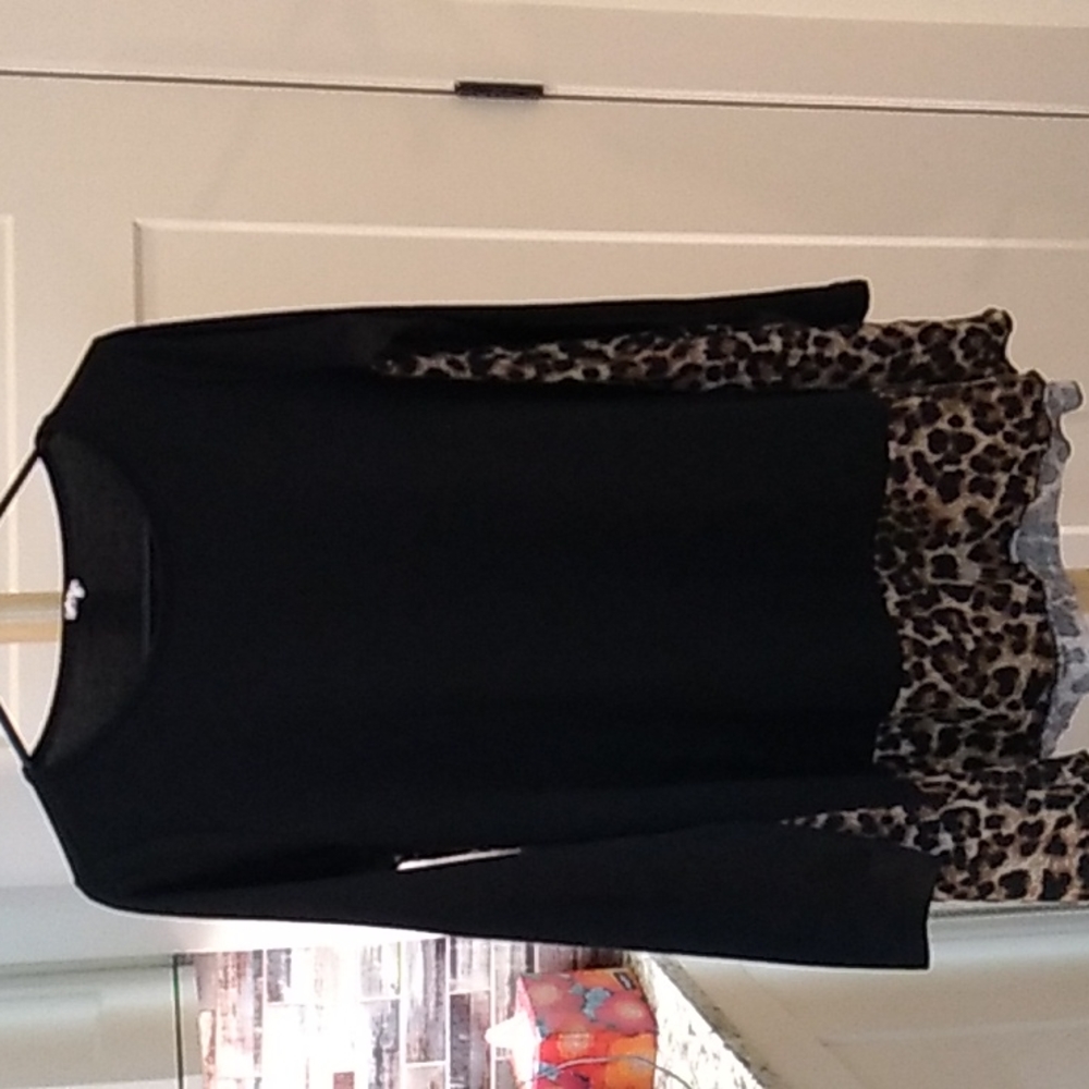 Black knit top with animal inset and border tunic